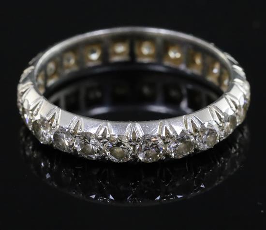 A platinum and diamond set full eternity ring, size O.